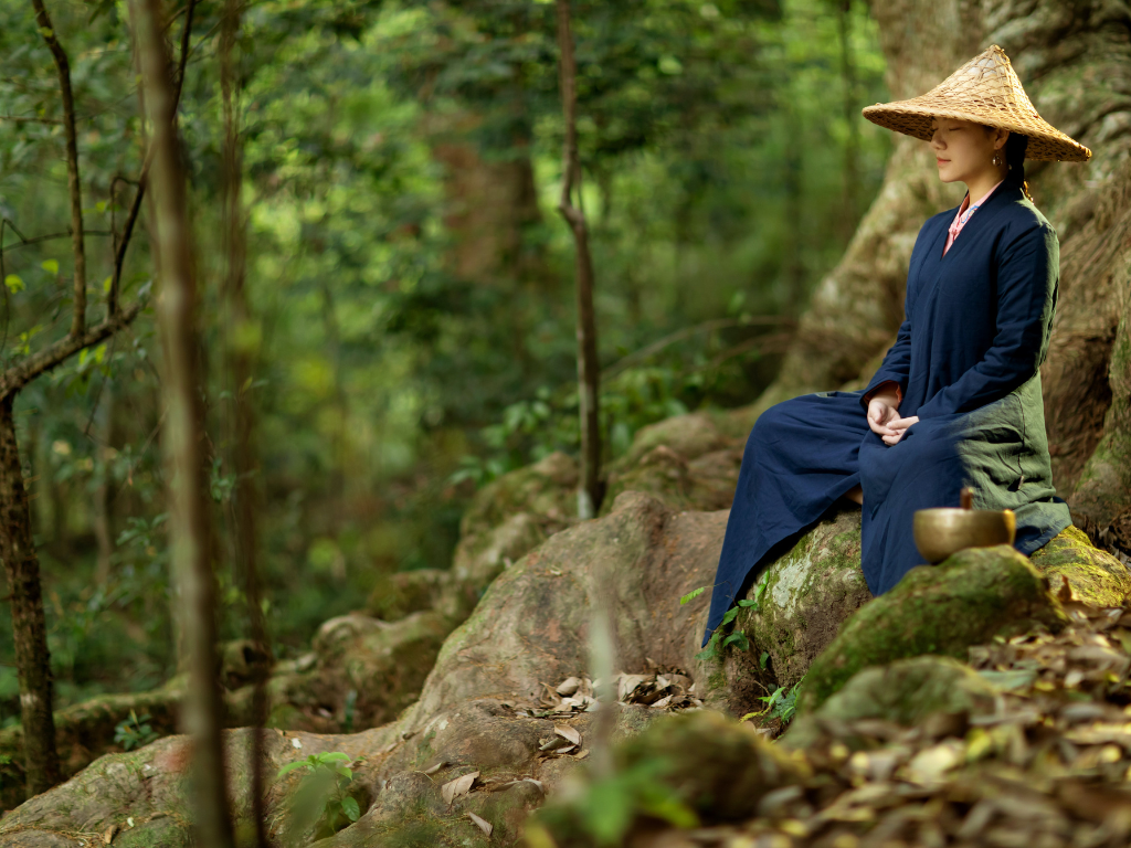 A woman performing Zen meditation